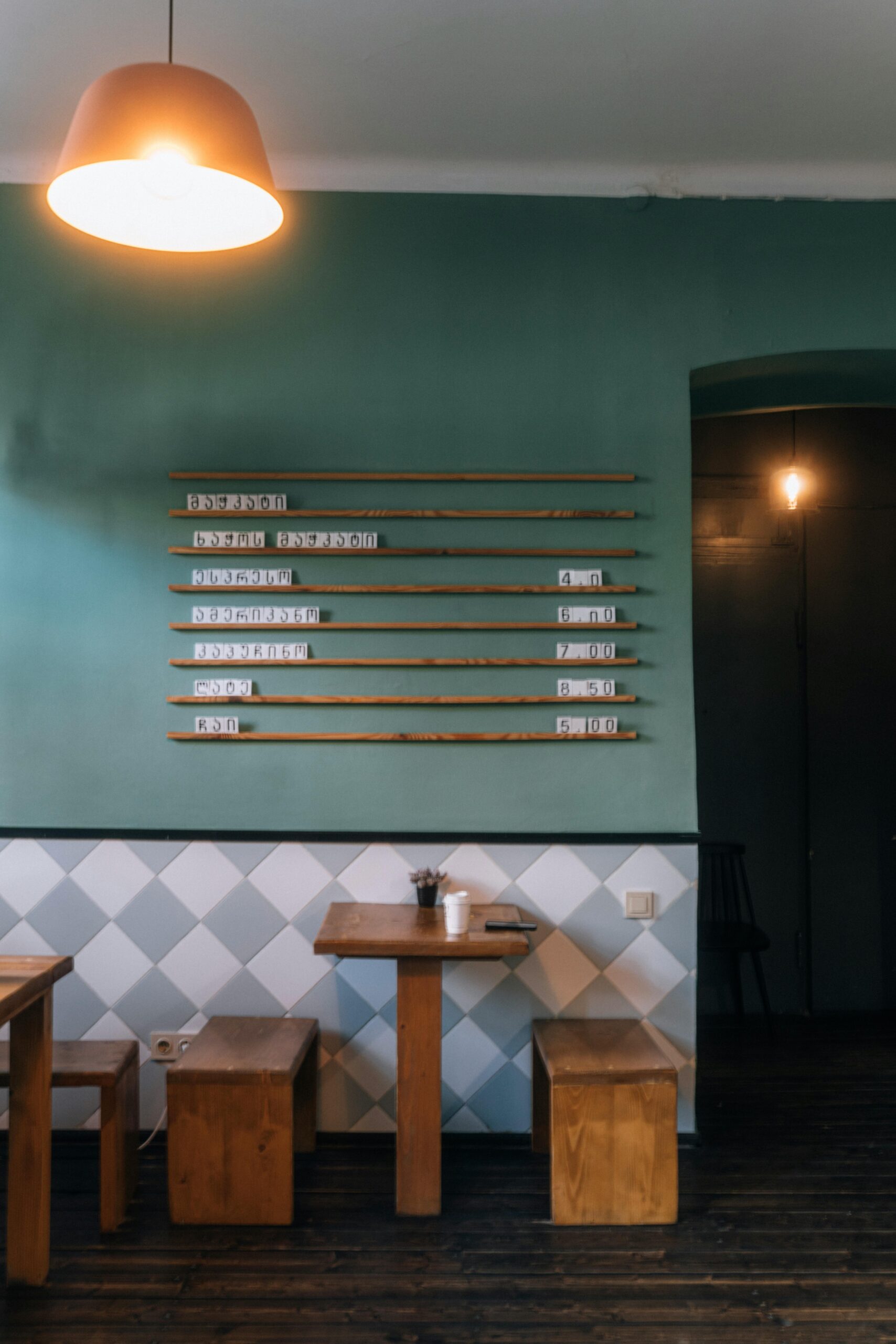 Warm and inviting cafe interior with modern decor in Tbilisi, Georgia.